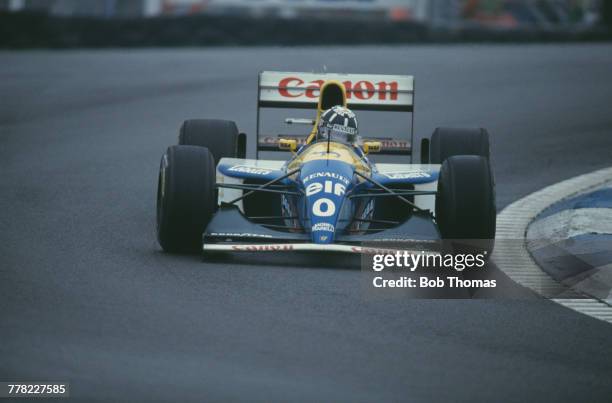 British racing driver Damon Hill drives the Canon Williams Renault Williams FW15C Renault RS5 3.5 V10 to finish in 2nd place in the 1993 European...