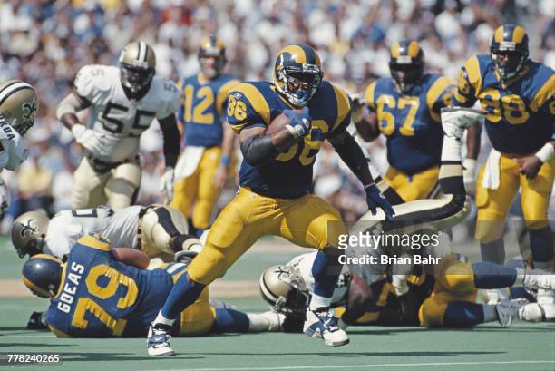Jerome Bettis, Running Back for the St. Louis Rams runs the ball during the National Football Conference West game against the New Orleans Saints on...