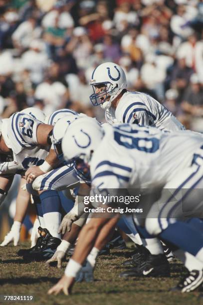 Jim Harbaugh, Quarterback for the Indianapolis Colts calls the play on the line of scrimmage during the National Football Conference West game...