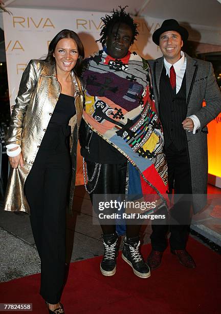 Mila Wiegand, Designer Mr. Moko and Kai Ebel pose at the opening of Mila Wiegands Exhibition "China" on November 08, 2007 in Duesseldorf, Germany.