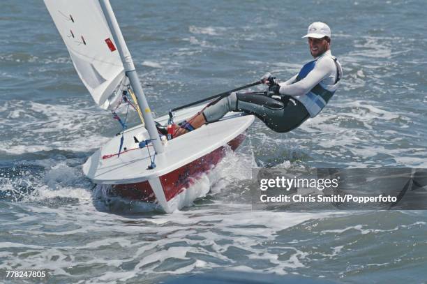 English sailor Ben Ainslie pictured in action during competition to finish in 2nd place to win the silver medal for Great Britain in the Laser class...