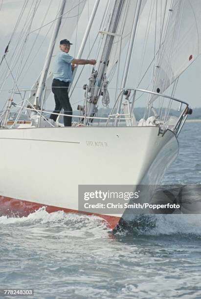 English sailor Francis Chichester pictured on his ketch Gipsy Moth IV under sail circa 1970. Francis Chichester became the first person to sail...