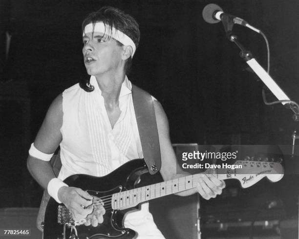 Guitarist Andy Taylor performing in Manchester with new romantic pop group Duran Duran, 6th December 1983.