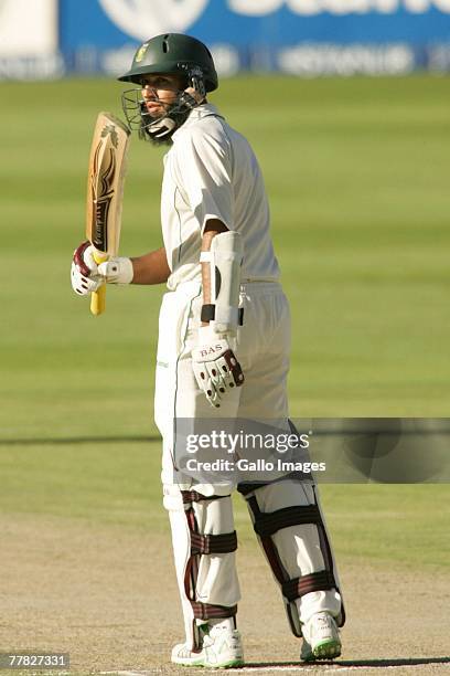 Hashim Amla celebrates his 50 runs during day two of the 1st test match between South Africa and New Zealand held at the Wanderers Stadium November...