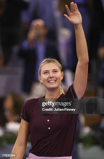Maria Sharapova of Russia celebrates defeating Ana Ivanovic of Serbia during day four of the Sony Ericsson WTA Tour Championships at the Madrid Arena...