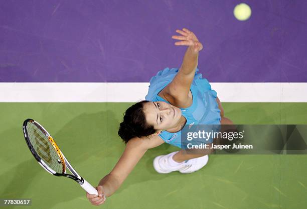 Anna Ivanovic of Serbia serves the ball to Maria Sharapova of Russia during day four of the Sony Ericsson WTA Tour Championships at the Madrid Arena...