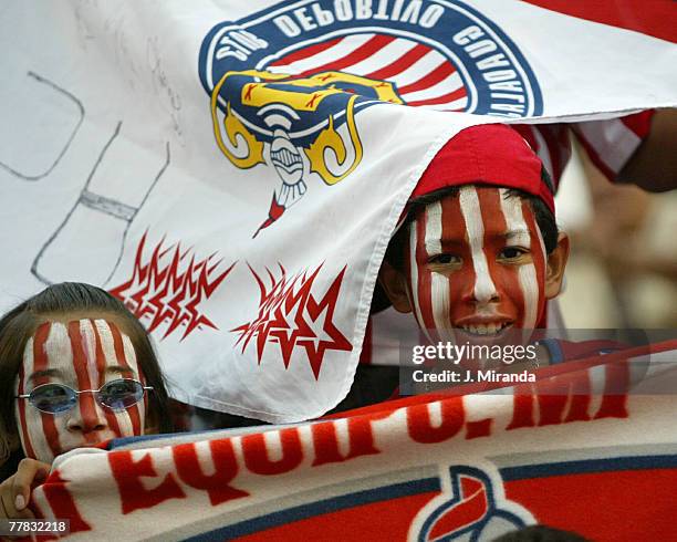 Chivas USA's fans celebrate the first goal against Real Salt Lake, as the two teams tied 1-1 at The Home Depot Center, in Carson, California on...