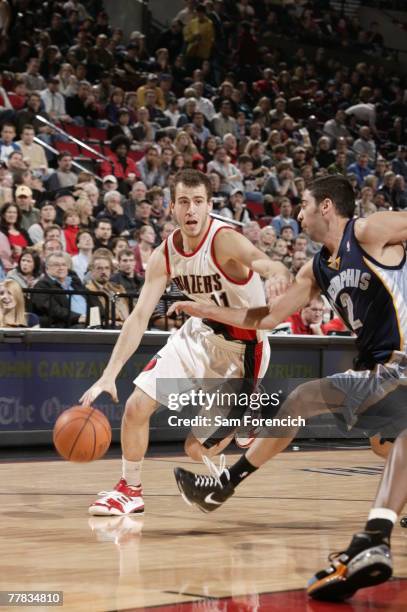 Sergio Rodriguez of the Portland Trail Blazers drives around Juan Carlos Navarro of the Memphis Grizzlies during a game on November 9, 2007 at the...