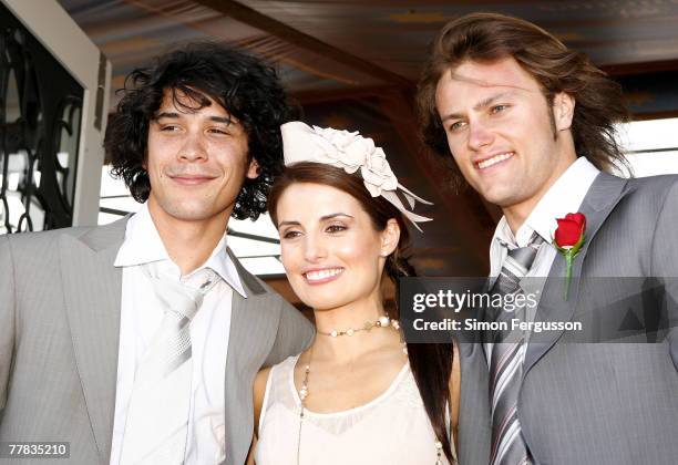 Actor Bobby Morley, Ada Nicodemou and Mark Furze attend the fourth day of the Melbourne Cup Carnival 2007, Emirates Stakes Day, at Flemington Race...