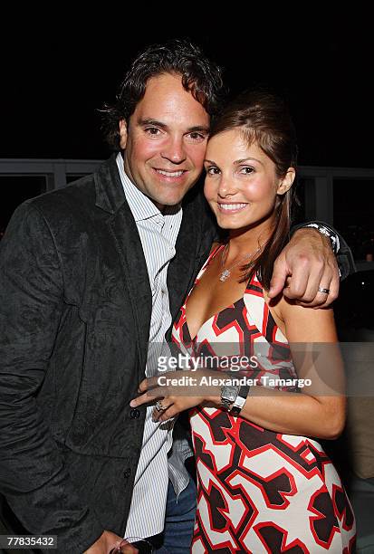 Mike Piazza and wife Alicia Piazza pose at the Setai Hotel penthouse during the Audemars Piguet party in celebration of the partnership with Miami...