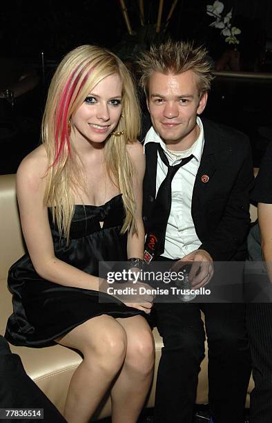 Singers Avril Lavigne and Deryck Whibley attend the grand opening of KOI Las Vegas at The Planet Hollywood Resort & Casino on November 09, 2007 in...