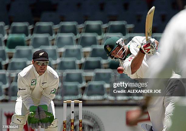 South Africa's batsman Jacques Kallis plays a shot against New Zealand during South Africa's second innings on the 3rd day of the first 5 day Test...