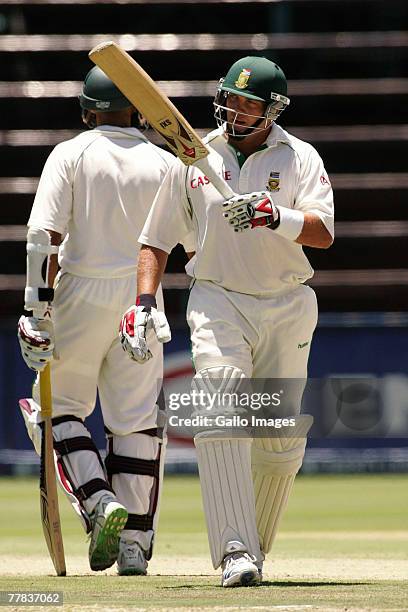 Jacques Kallis of South Africa celebrates reaching 9000 runs in test cricket during day three of the 1st test match between South Africa and New...
