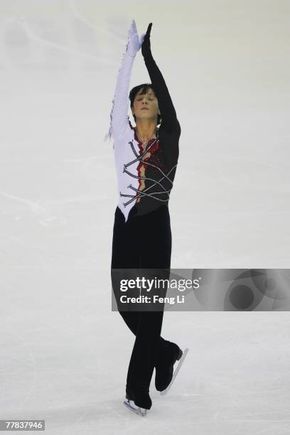 Gold medalist Johnny Weir of USA skates in the Men Free Skating during the Cup of China Figure Skating competition, which is part of the ISU Grand...