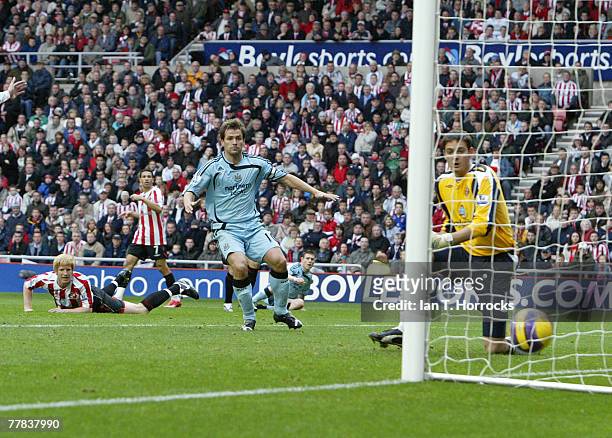 Michael Owen looks on as James Milner scores the first goal for Newcastle United during the Barclays Premier League match between Sunderland and...