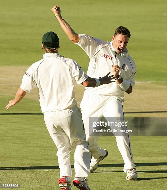 Andre Nel and AB de Villiers celebrate the wicket of Stephen Fleming during day three of the 1st test match between South Africa and New Zealand held...