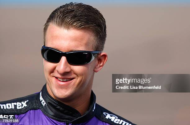 Allmendinger, driver of the Imation Dodge, stands on the grid during qualifying for the NASCAR Busch Series ARIZONA.TRAVEL 200 at Phoenix...