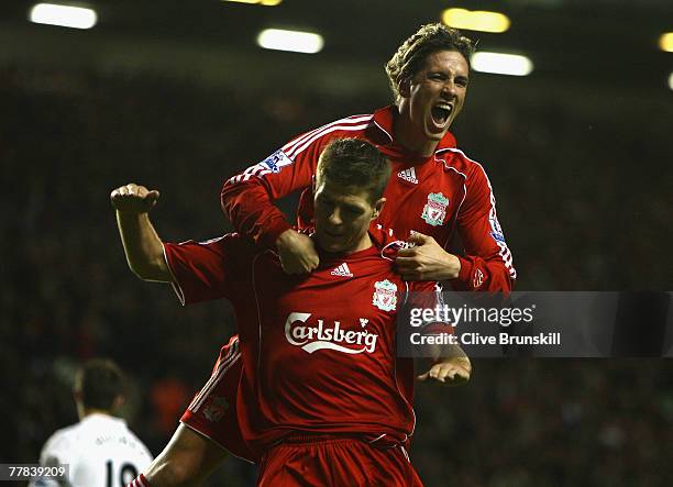 Steven Gerrard of Liverpool celebrates with Fernando Torres of Liverpool after scoring his team's second goal during the Barclays Premier League...