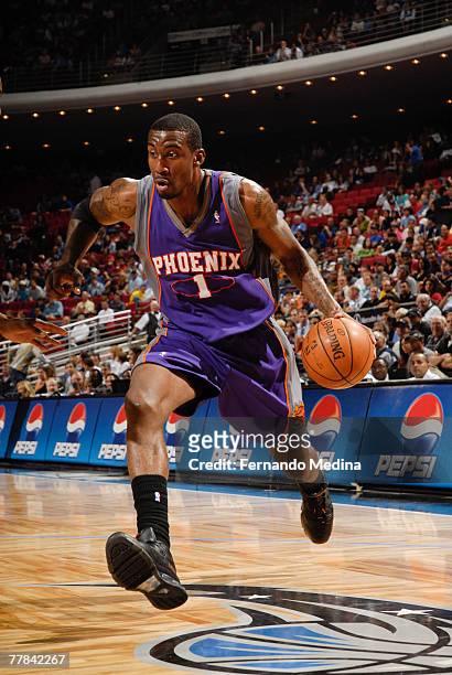 Amare Stoudemire of the Phoenix Suns dribbles against the Orlando Magic at Amway Arena on November 10, 2007 in Orlando, Florida. NOTE TO USER: User...