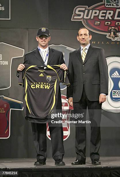 Jason Garey stands with MLS Commissioner Don Garber after being selected as the third overall pick by the Columbus Crew at the MLS Super Draft 2006....