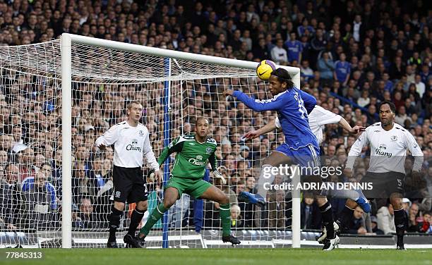 Chelsea's Didier Drogba heads the ball to score the opening goal against Everton during the Premiership football match at Stamford Bridge in London...