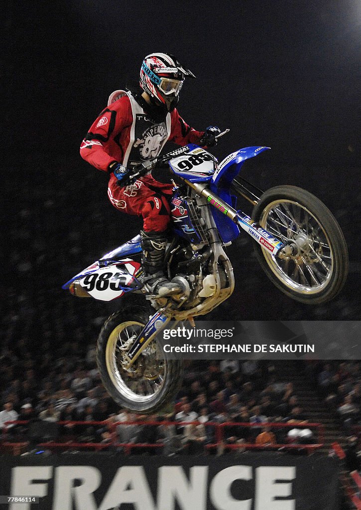 French Motorcross Racers A competitor rides during the French Supercross motorcycling race, 11 ...