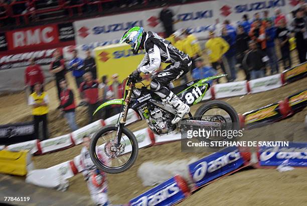 Competitor rides during the French Supercross motorcycling race, 11 November 2007 at the Bercy sport hall in Paris. AFP PHOTO STEPHANE DE SAKUTIN