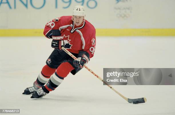 Wayne Gretsky of Canada controls the puck during the Group D game against the United States in the Men's Ice Hockey tournament on 16 February 1998...