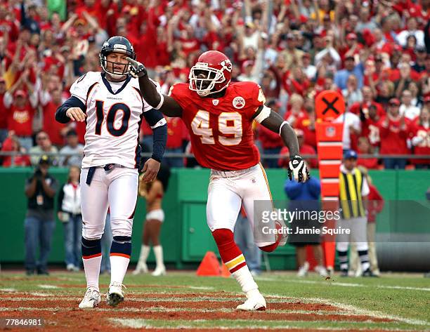 Bernard Pollard of the Kansas City Chiefs celebrates after blocking a punt by kicker Todd Sauerbrun of the Denver Broncos that resulted in a sefety...