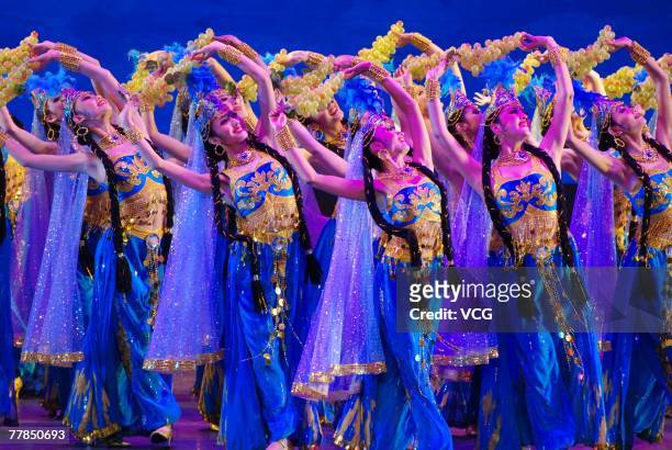 Dancers perform during the finals of the 6th Lotus Award China National Dance Competition on November 11, 2007 in Guiyang, Guizhou Province, China.