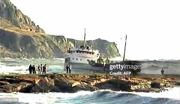 Russian NTV channel television grab shows a cargo ship running aground 12 November 2007 during a storm off the coast of Ukraine's Crimea peninsula in...