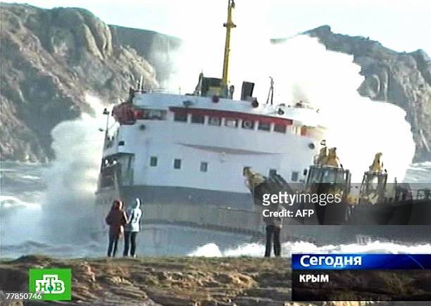 Russian NTV channel television grab shows a cargo ship that ran aground 12 November 2007 during a storm off the coast of Ukraine's Crimea peninsula...