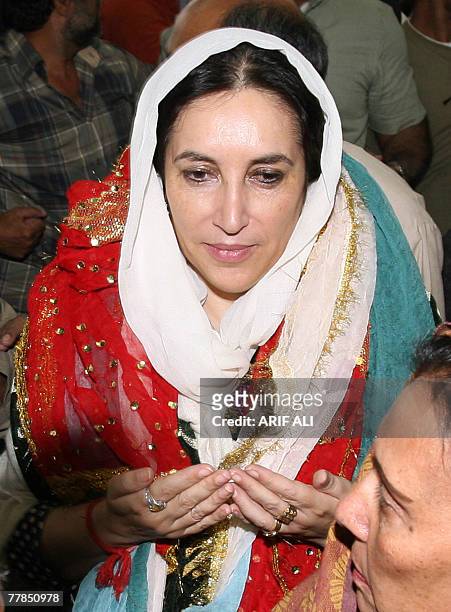 Former Pakistani prime minister Benazir Bhutto prays at a shrine of Islamic saint Syed Ali bin Osman Al-Hajvery, popularly known as Data Ganj Bakhsh...