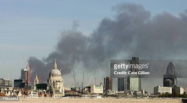 Large plume of thick black smoke is visible across the whole of the London skyline on November 12, 2007 in Waterloo, London, England. The smoke,...