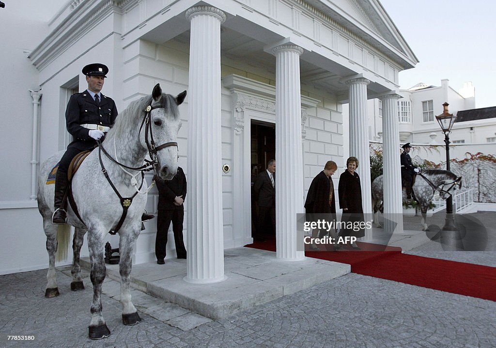 President of Finland Tarja Halonen (R) w