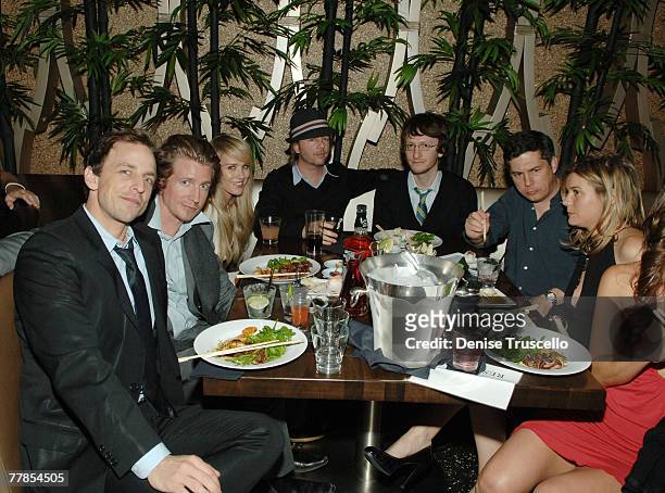 Comedian Seth Meyers, actor Josh Meyers, actor/comedian David Spade, writer Akiva Schaffer and comedian Chris Parnell attend the grand opening of KOI...