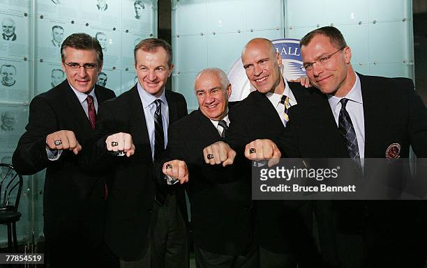 Ron Francis, Al MacInnis, Jim Gregory, Mark Messier and Scott Stevens show off their Hall of Fame rings at the Hockey Hall of Fame press conference...
