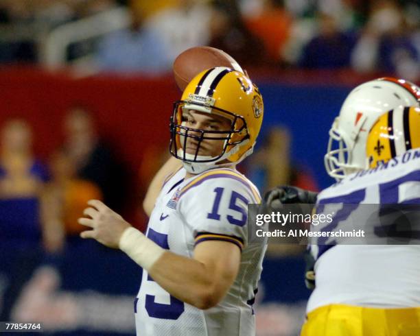 Quarterback Matt Flynn sets to pass against the University of Miami defense during the 2005 Chick-fil-A Peach Bowl on December 30, 2005 at the...