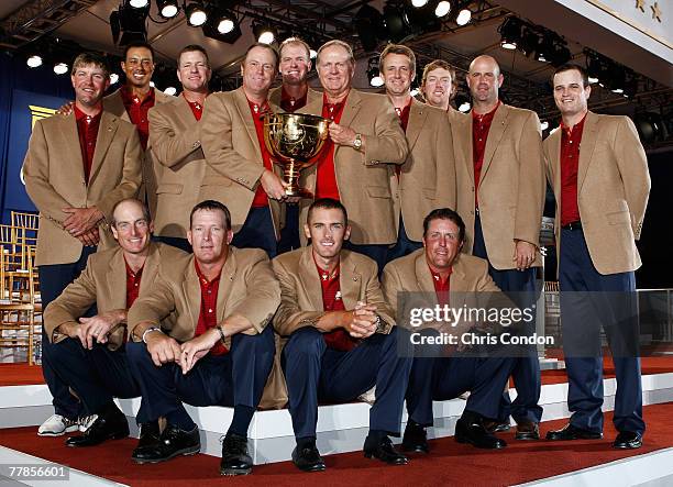 The U.S. Team poses with the President's Cup after defeating the International Team 19.5 to 14.5) during the Closing Ceremony of The Presidents Cup...