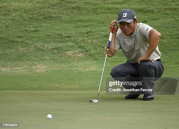 Shigeki Maruyama lines upa putt on te 13th hole during the second round of the Valero Texas Open at La Cantera Golf Club October 5, 2007 in San...