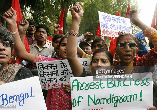 Activists from the Communist Party of India New Democracy shout anti-government and West Bengal government slogans during a protest against the...