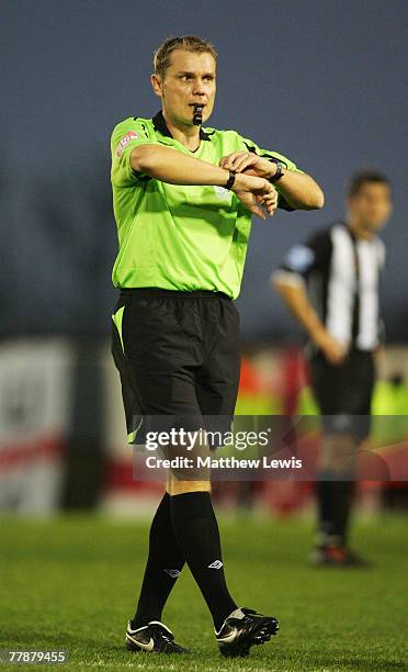 Referee Graham Scott in action during the FA Cup sponsored by Eon First Round match between Forest Green Rovers and Rotherham United at The New Lawn...