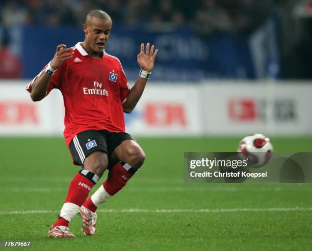 Vincent Kompany of Hamburg runs with the ball during the Bundesliga match between Schalke 04 and Hamburger SV at the Veltins Arena on November 10,...