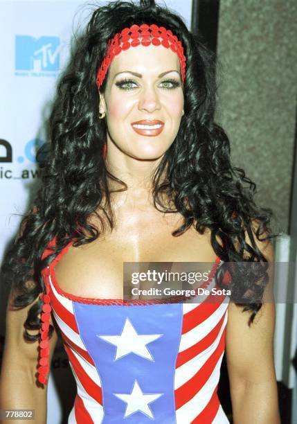 Wrestling personality Chyna poses for photographers September 7, 2000 at the 2000 MTV Video Music Awards at Radio City Music Hall in New York City.