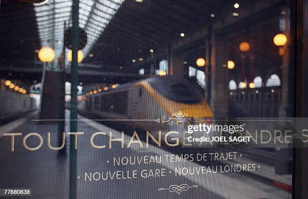 Message announcing the new Eurostar service between Paris and St Pancras, is seen at the Gare du Nord train station in Paris, 13 November 2007 on the...