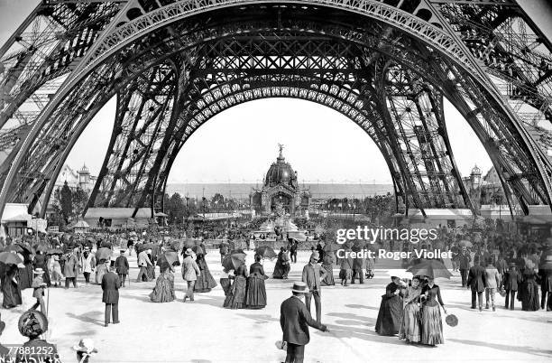 View of the newly-built Eiffel Tower towards the Dome Central during the Paris Exposition Universelle or World Fair of 1889.