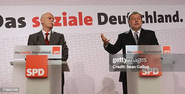 German Social Democrats Chairman Kurt Beck and SPD Bundestag faction leader Peter Struck speak to the media after Vice Chancellor and Minister of...