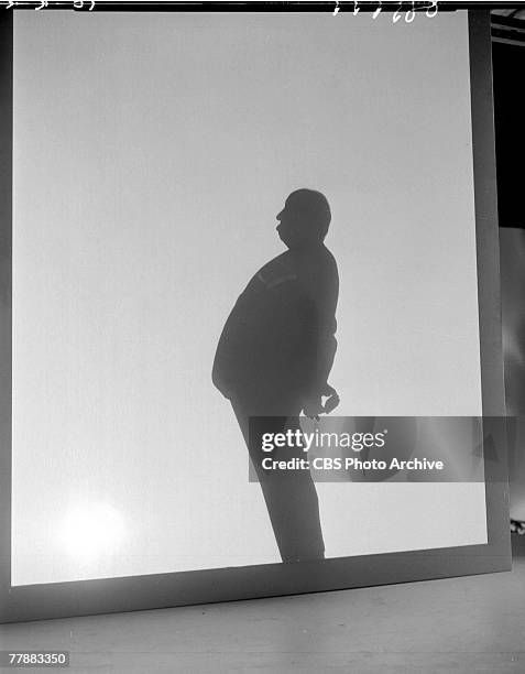 Silhouette of British-born American film and television director Alfred Hitchcock , for the opening sequence of his anthology program 'Alfred...