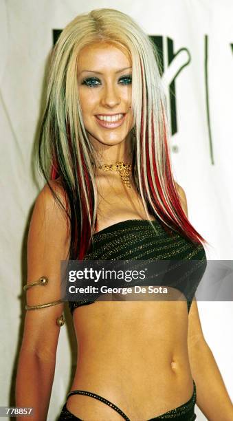 Christina Aguilera poses for photographers September 7, 2000 at the MTV Awards at Radio City Music Hall in New York City.