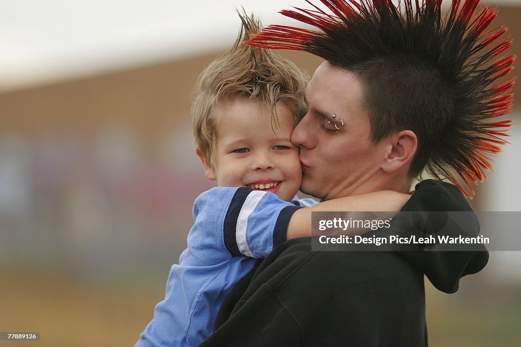 Teenager with young boy